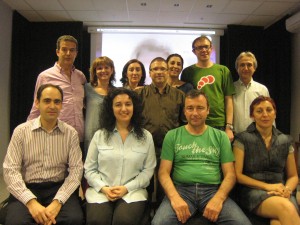 Standing from left to right: Rafa Saiz, Pilar Fernández, Noemí, Michael Thallium, Carla Franco, Fran, Paco Torres. Sitting: Jesús Iglesias, Victoria Caro, José Luís Romero, Deme Salas